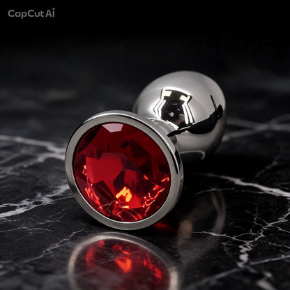 Plug anal de acero con joya roja - presentación elegante